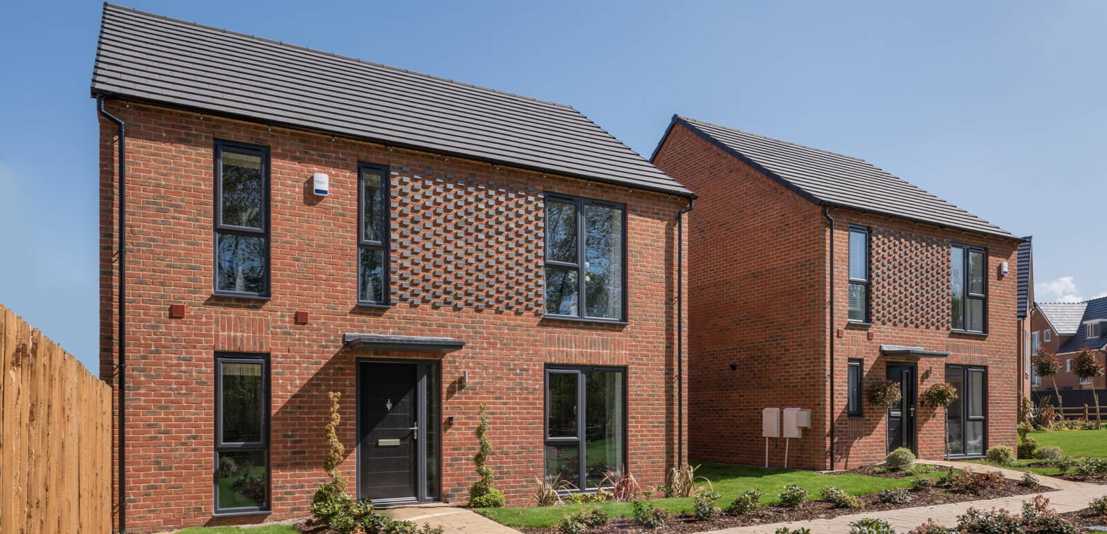 Striking brick detail with anthracite windows. image